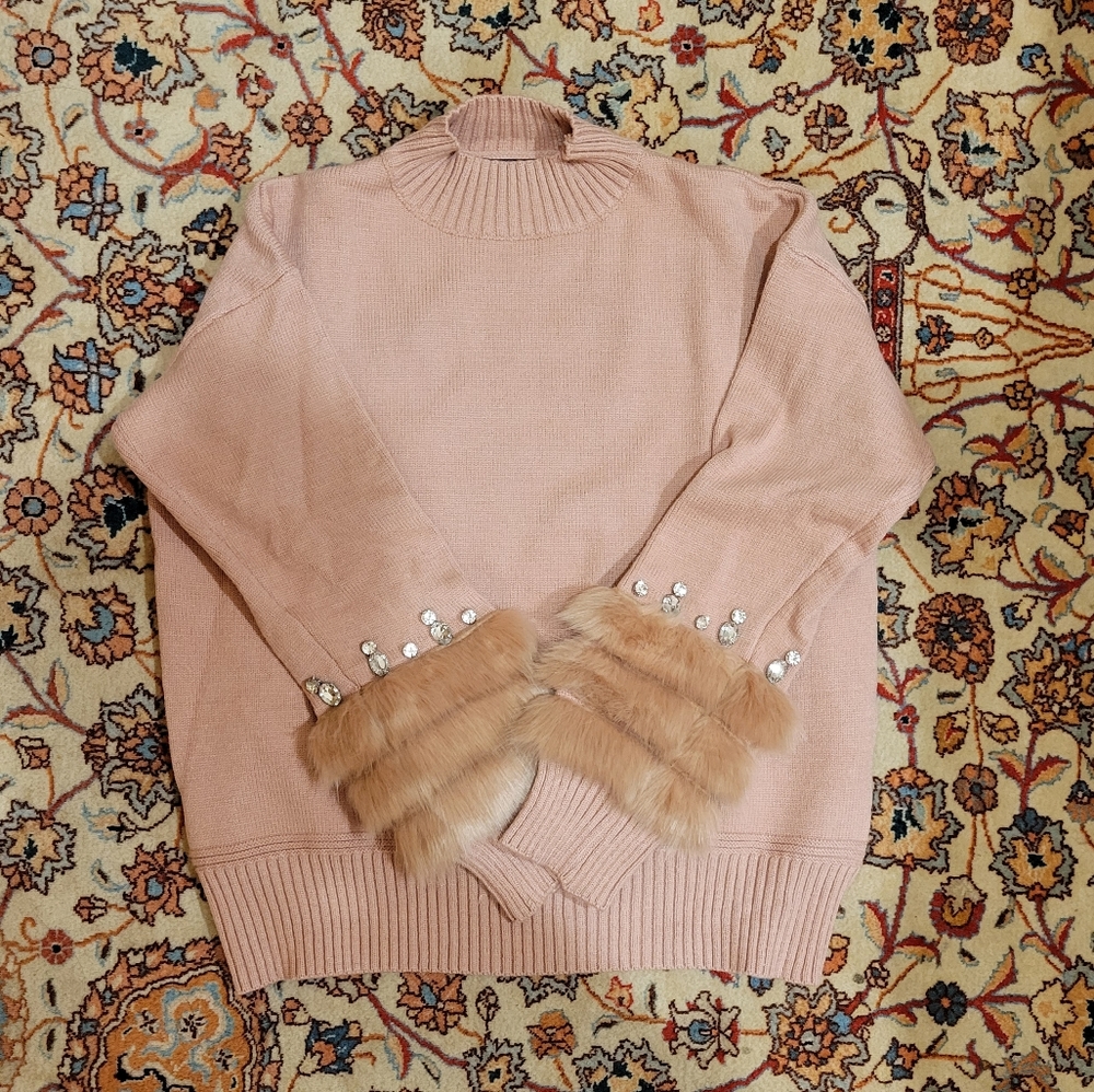 Pink winter sweater with fur and jeweled sleeves